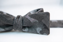 A black & grey Camouflage Cotton Bow Tie.  Height: 3” x Width: 4.5"   Knot Size: .75”  (Approx.)  Dry Clean Only