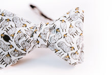 black sheep cotton bow tie with a butterfly design.