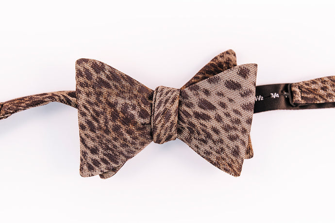 Cheetah Print Wool Twill Bow Tie With A Butterfly Design.